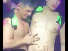 Young Asian strippers Allen and Enzo dance sexily.