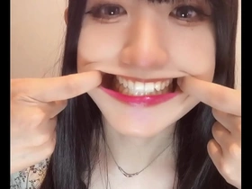 Beautiful crossdresser Chikas tooth fetish: A short and sexy video.
