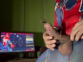 Young Asian man masturbates while playing video game