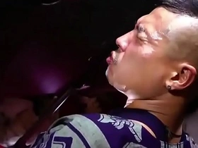 Asian men engaged in group sex with facial finish
