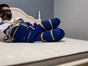 Continuation of Asian boy’s bondage and seduction with a tape gag.