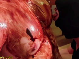 He is coated with chocolate and we are going to lick him all over and suck his nipples. Hot