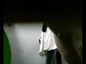 Young Asian boy washes up in the shower.