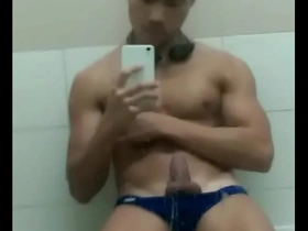 Asian man pleasuring himself