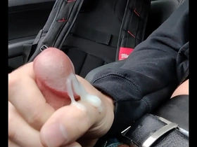 Cum dripping from my hand after a hot bi action in the car