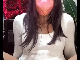 Crossdresser masturbates while live streaming.