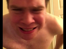 A pitiful man cries and whimpers while he spanks himself.