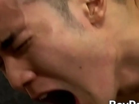 Young Japanese hunk Yoshi Kawasaki gets a hardcore doggy style fuck and then cums hard.