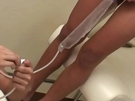 Asian doctor enjoys piss play and drinks from a cum stained toilet bowl