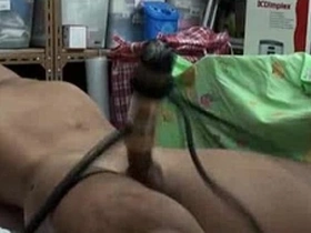 Gay Asian bondage scene with milking and Venus themes