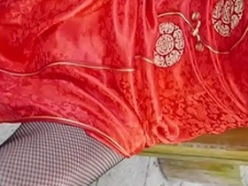 Japanese crossdresser in qipao stockings, solo boy BDSM scene.