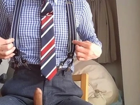 Gay solo masturbation with a fetish for suits and ties.