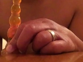 See how I use my lips to suck my dildo in this solo boy action.