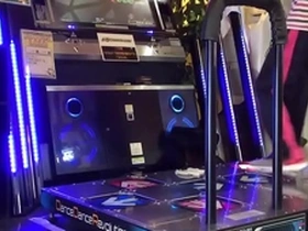 Gay Japanese man enjoys DDR with a hard cock