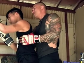 Asian jocks masturbate and deep throat each other before anal sex with a ball gag