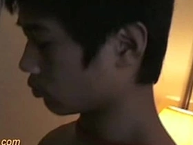Young Thai boxer in BDSM bondage gets a sensual handjob
